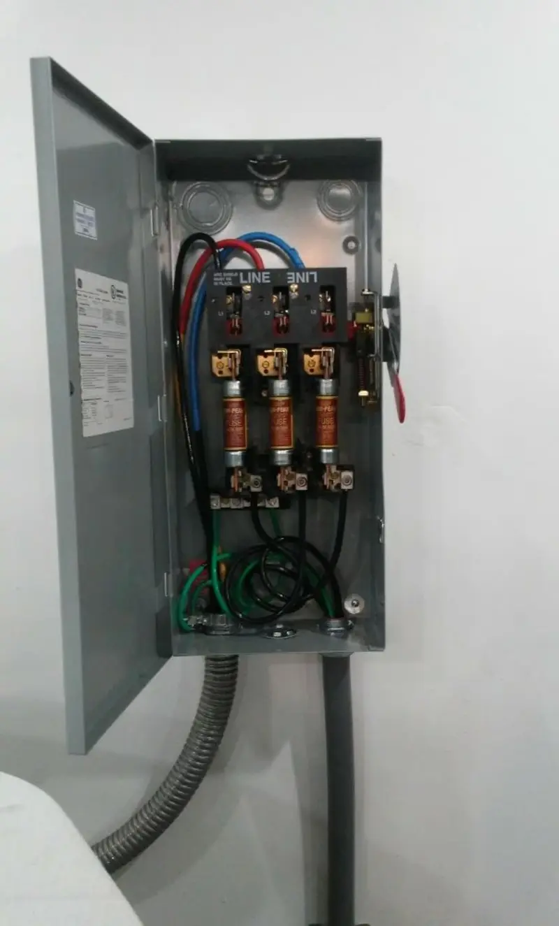 Three-phase disconnect switch installed for Smoke Detector Installation in Bayshore Gardens